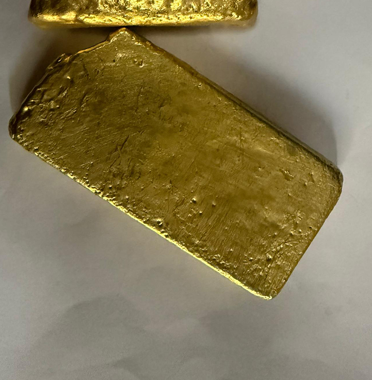 Authentic gold bar showcased by East Africa Mineral Consultancy for investment and mining projects